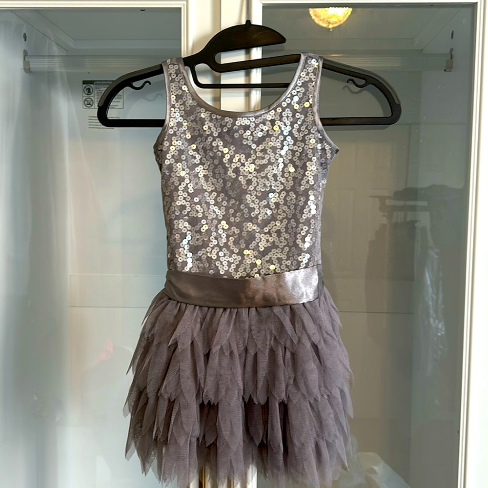 Biscotti collezion silver sequined girls size 3 dress worn once practically new.